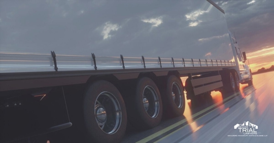 Large tractor trailer on the road.